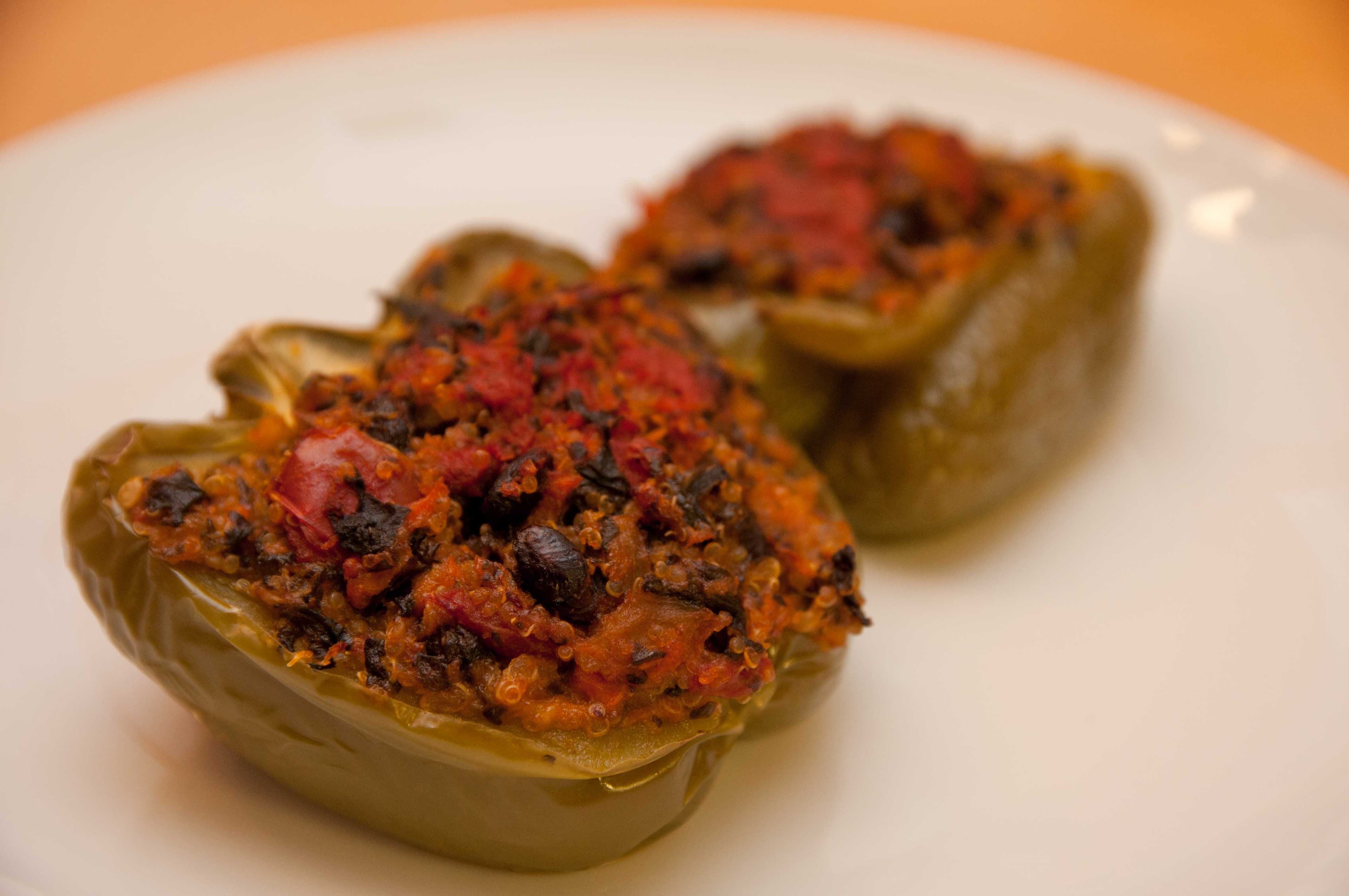 Colorful paleo stuffed peppers in a baking dish