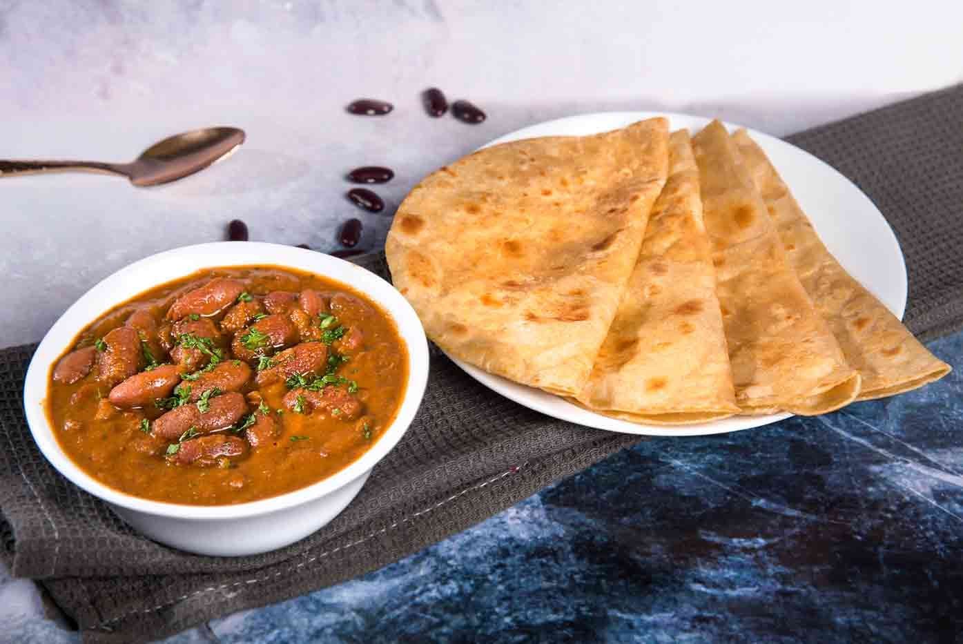 Bowl of rajma kidney bean curry over steamed rice