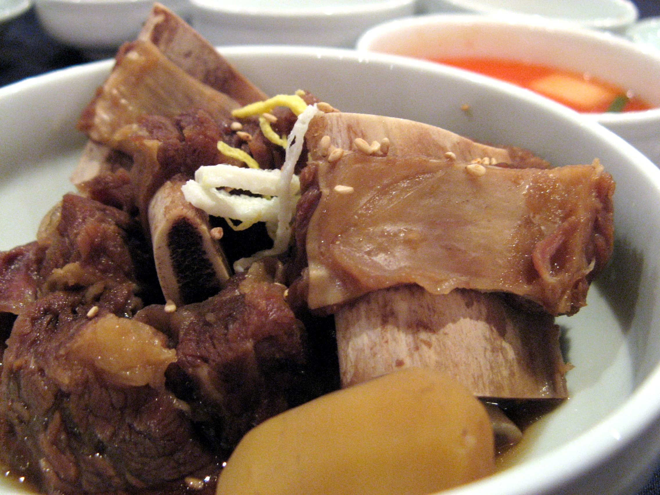 Galbi-jjim braised short ribs with chestnuts in dark glaze