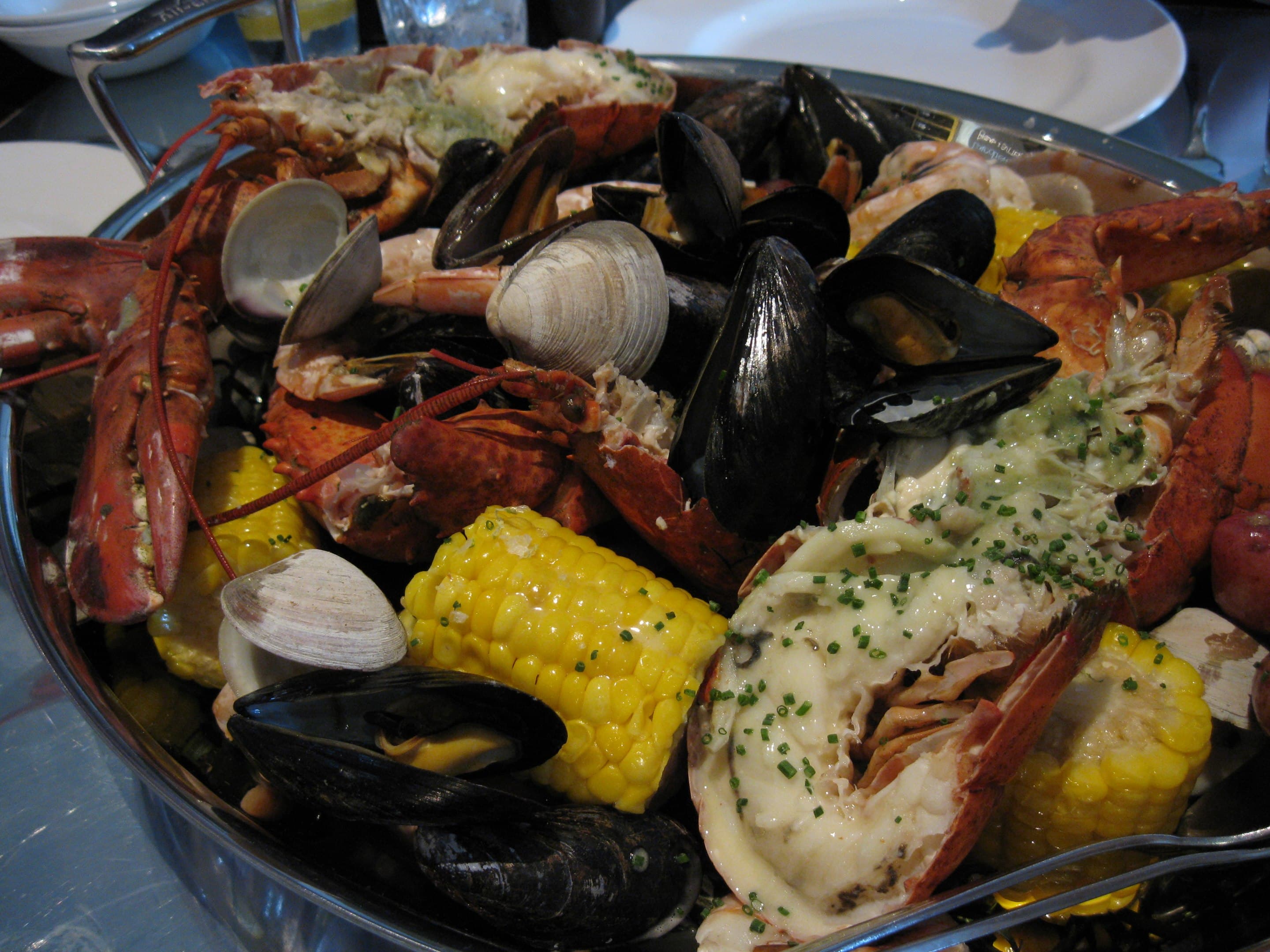New England clam bake spread with lobster clams and corn