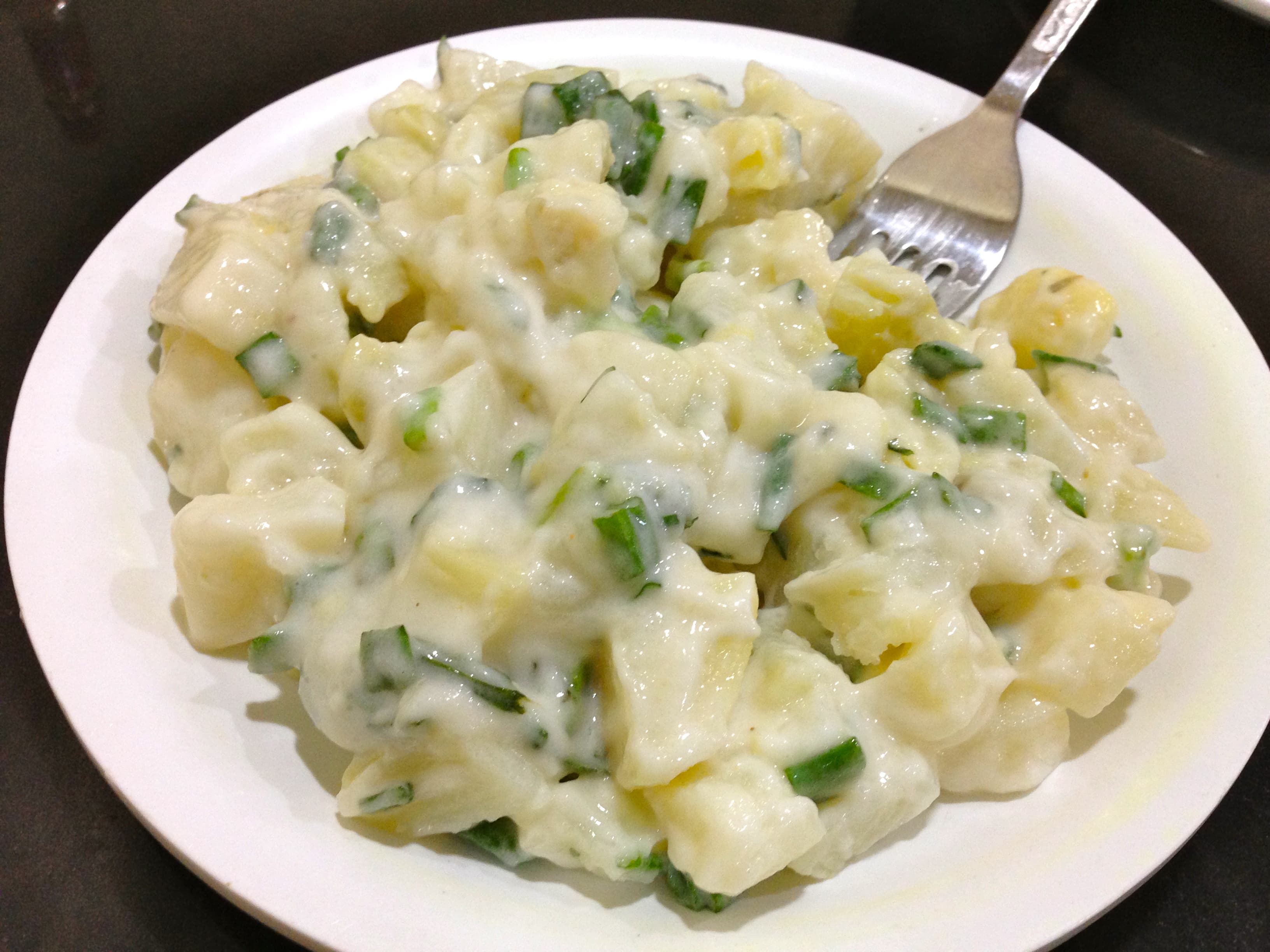 Bowl of Japanese potato salad with cucumber and ham