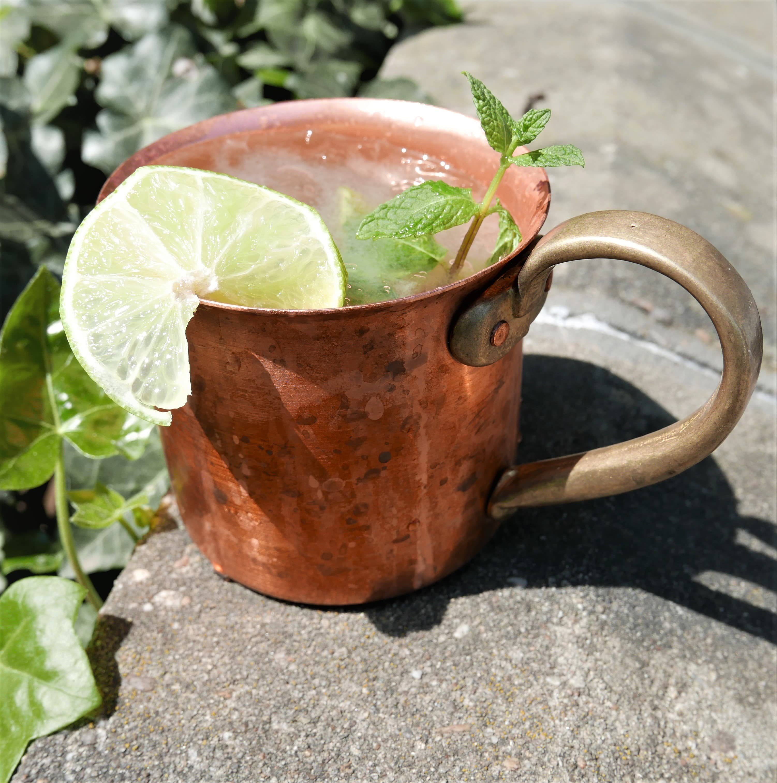 Moscow mule in a copper mug with lime and ginger